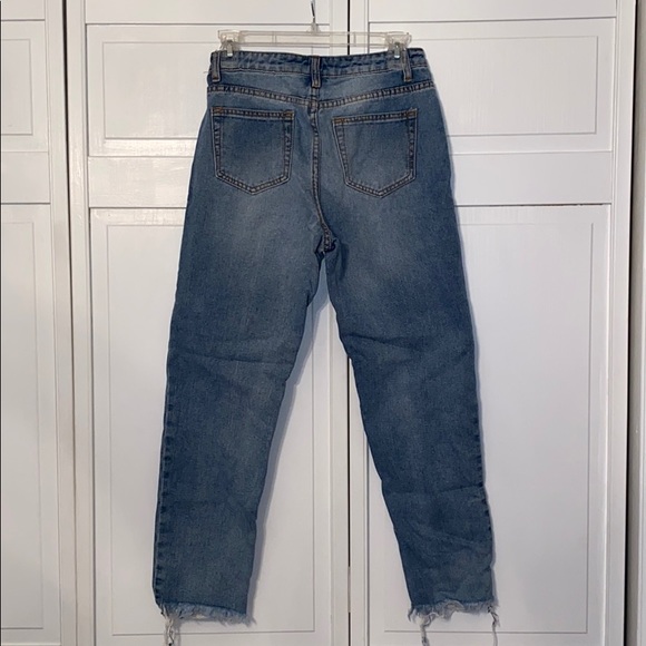 Blue jeans with white zipper - Picture 2 of 3